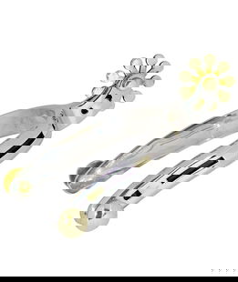 Speroni western in acciaio inox con decorazioni in ottone