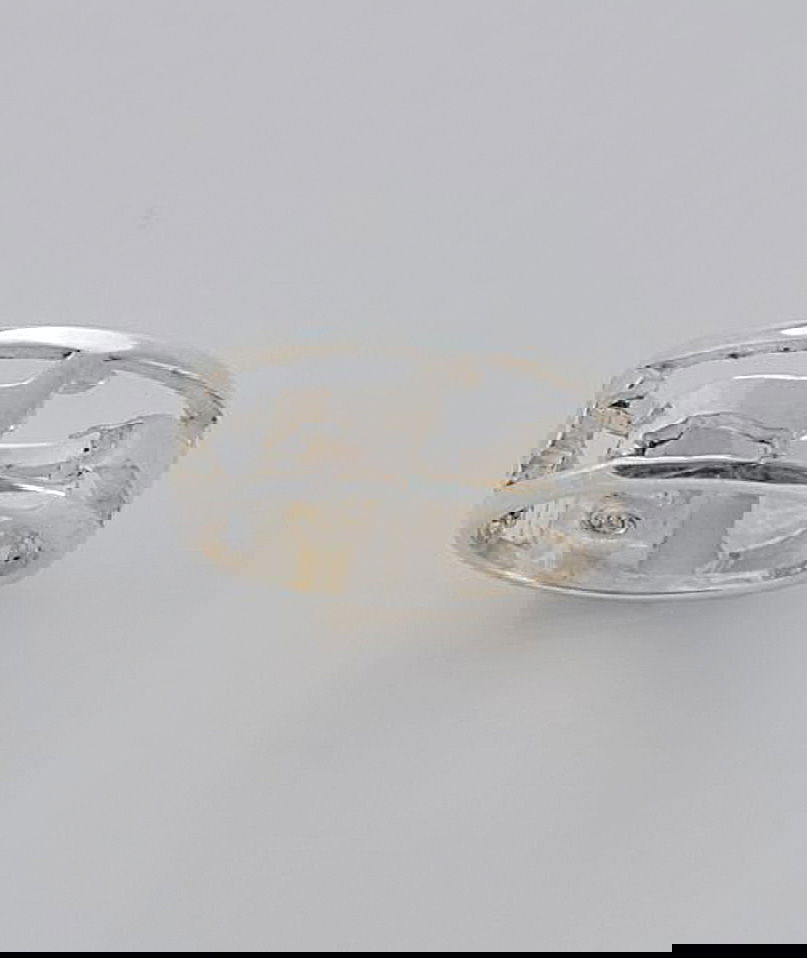 Fedina in argento a fascia con quattro bassotti traforati