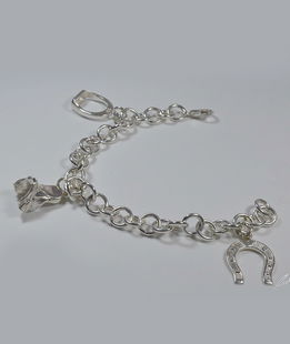 Bracciale argento pendenti tipici monta inglese