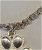 Bracciale a catena in argento con pendenti a forma di zampa - foto 1