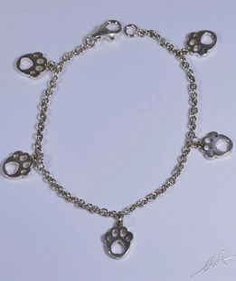 Bracciale catena argento orme pendenti