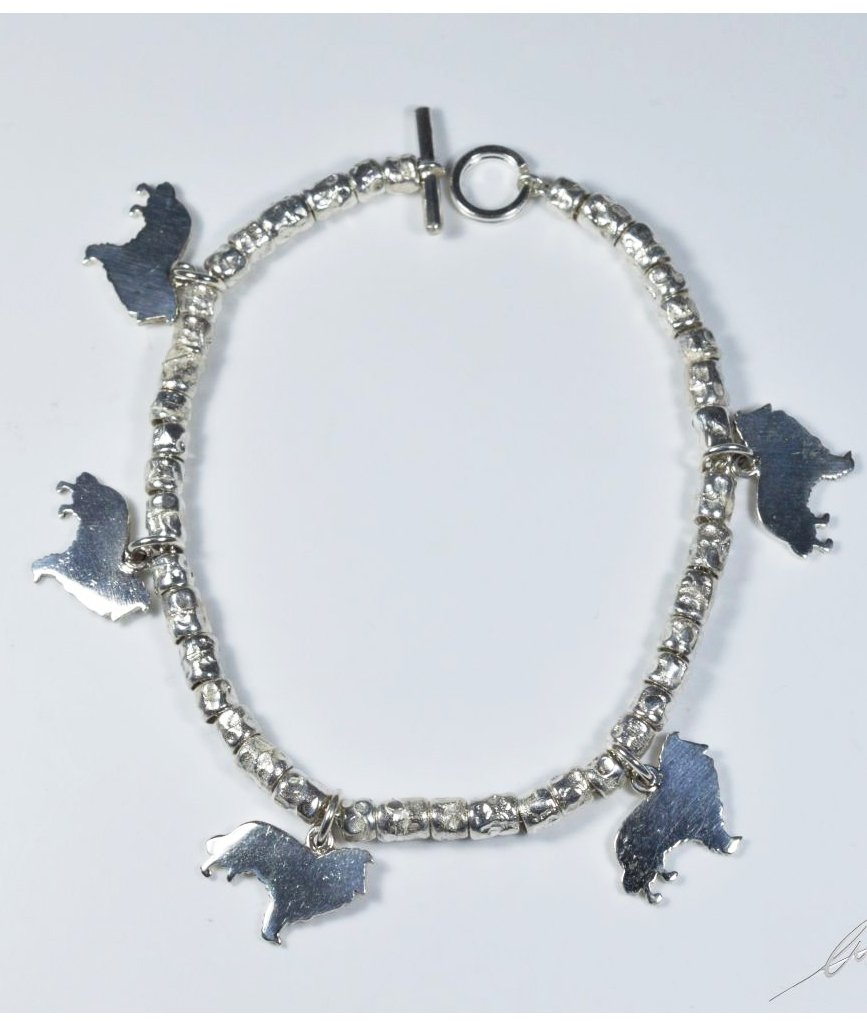 Bracciale a intercalari in argento, con sagome pendenti di cane razza Collie/Shetland
