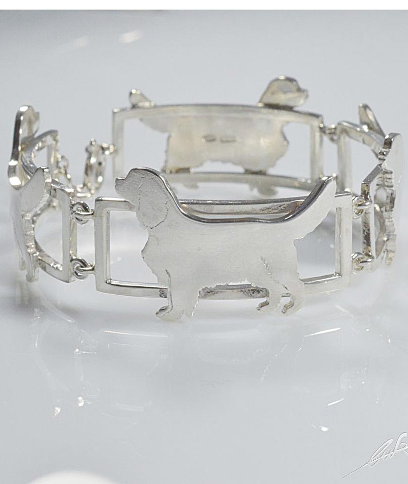 Bracciale a 4 sezioni in argento, con sagome di cane razza Cavalier King