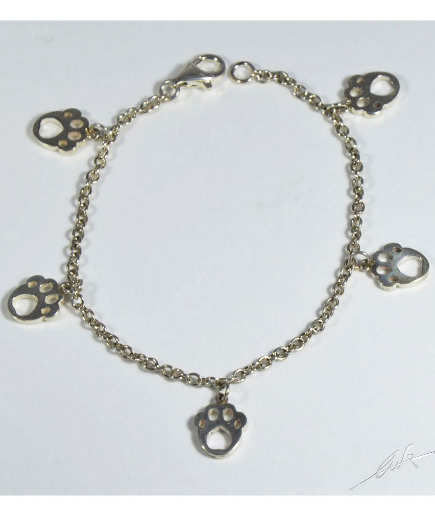 Bracciale a catena rolò con orme traforate pendenti in argento 925