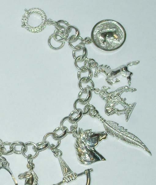 Bracciale in argento con pendenti soggetto equestre - foto 3